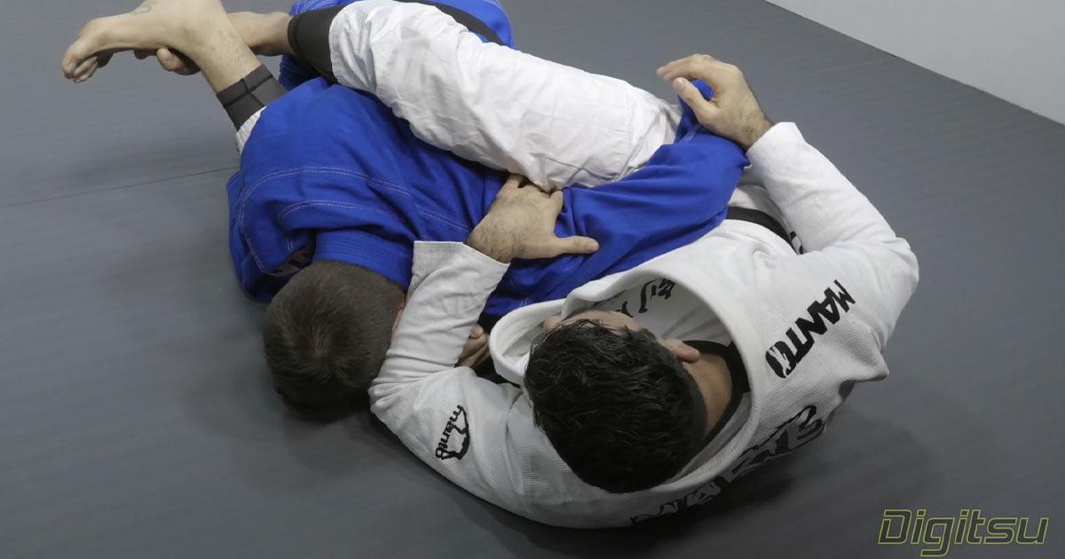 Abraham Marte using an angle from closed guard similar to the clamp guard.