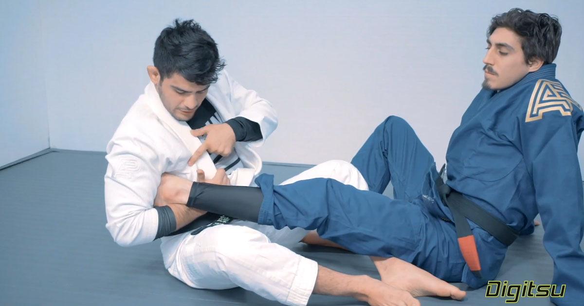 Johnny Tama explains the finer details of the straight ankle lock grip.