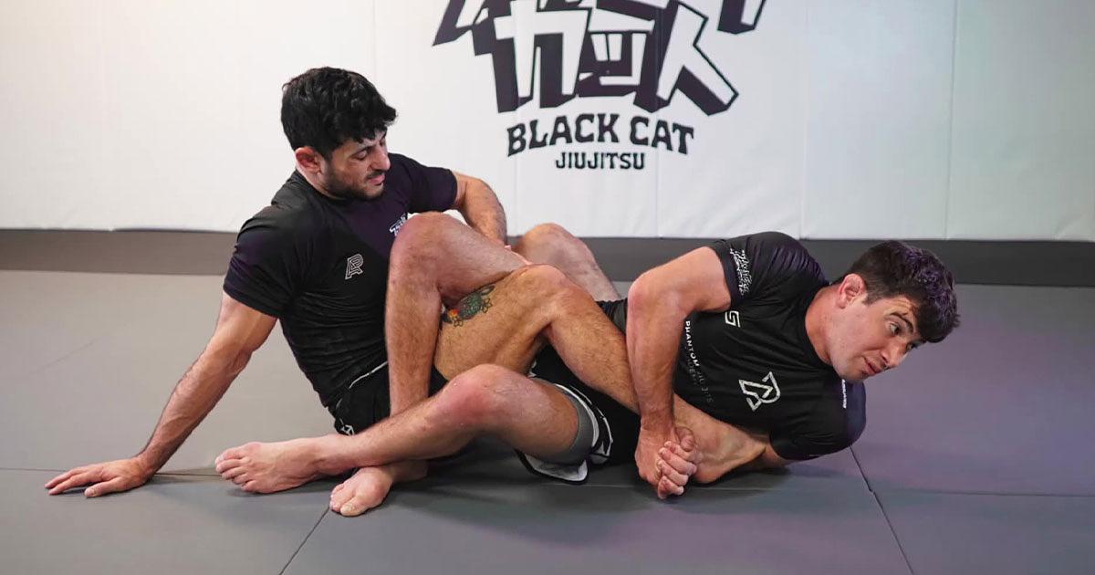 Frank Rosenthal applies an outside heel hook on Adam Benayoun.